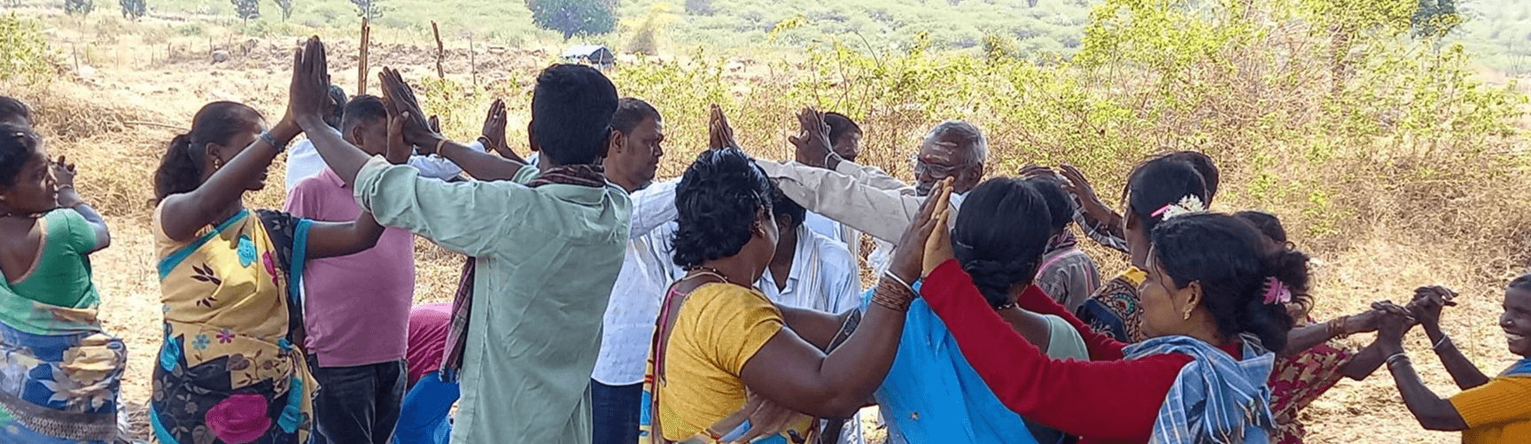 Community gathering around fire